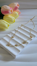 Collier en acier inoxydable petites fleurs en perle